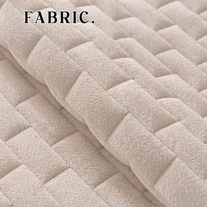 Cream crystal velvet sofa cover with square quilted pattern and non-slip texture