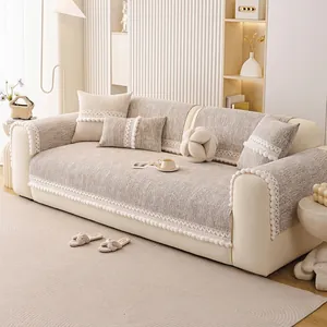 Minimalist beige chenille sofa cover with vertical stripes and elegant fringe decorative edges