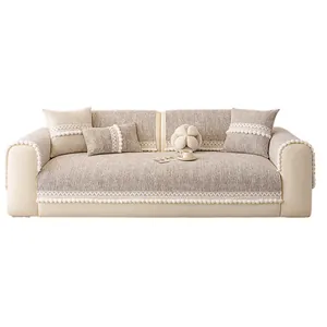 Thick non-slip beige sofa cover set with decorative lace trim and petal cushion