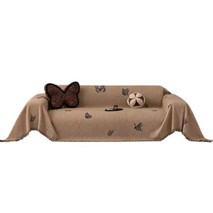 French luxury light brown sofa cover with leaf texture, butterfly print and fringe edges