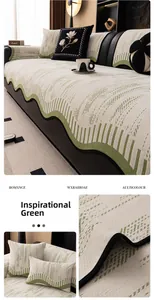 Detail of chenille sofa cover with green geometric patterns and scalloped black edges