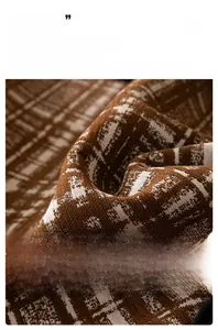 Macro detail of luxury chenille fabric with premium geometric weave and soft texture