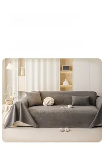 Close-up of gray cloud velvet sofa cover with soft plush texture and matching pillows