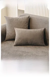 Detailed texture of waterproof grey-brown chenille sofa cover and matching cushions
