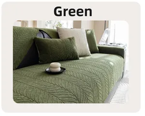 Detail of green chenille sofa cover showing leaf vein texture and knit fabric surface
