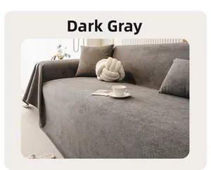 Detail view of deep gray cloud-touch velvet sofa cover with creative knot cushion