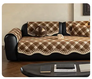 Detail of chenille sofa cover showing wavy edges and brown checkerboard pattern texture