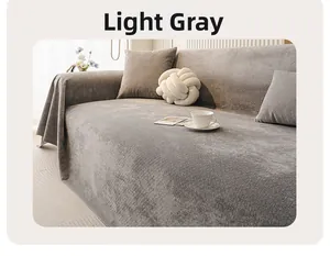 Detail of light gray velvet sofa cover showing thick texture and soft draped fabric on couch