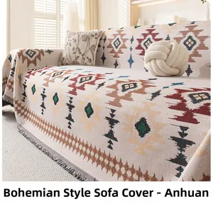 Detail of bohemian sofa throw with geometric patterns and fringe tassels in Anhan style