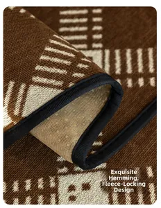 Detailed view of striped chenille sofa cover with exquisite binding and non-slip backing