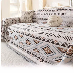 Detailed view of Bohemian thick sofa cover with geometric patterns and fringe edges