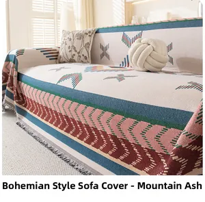Detailed close-up of Bohemian woven sofa cover with ethnic geometric patterns and tassels