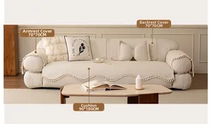 Detailed cream chenille sofa cover set with scalloped edges and fringe tassels