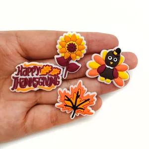 4-piece Thanksgiving PVC shoe charms set including turkey, sunflower, and maple leaf motifs