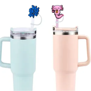 Insulated tumblers with handles, straws, and cute cartoon salamander dust caps
