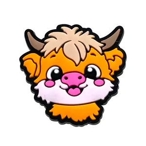 Detailed close-up of a 2D PVC Highland Cow charm for clog shoe decoration accessories