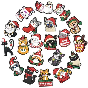 20pcs Christmas cat PVC shoe charms set featuring festive holiday patterns on white background