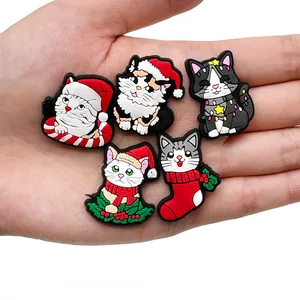 Christmas cat shoe charms set featuring 5 PVC cartoon kittens in festive holiday hats
