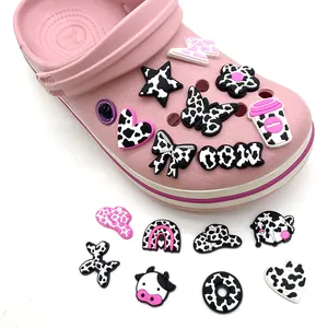 Pink and black cow print PVC shoe charms set for DIY clogs featuring cowboy theme