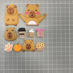 Set of 9 cute capybara charms for hole shoes including coffee and orange designs