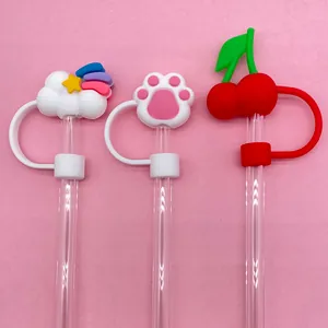 Cartoon silicone straw covers with rainbow, cat paw, and cherry designs for cups