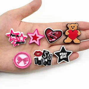 7-piece set of Y2K style PVC cartoon shoe charms featuring pink stars and cute bears