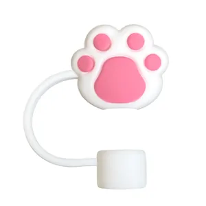 Close-up of cute pink cat paw silicone straw cover cap for tumbler dust protection