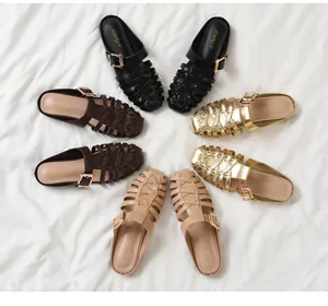 Detailed view of woven mule sandals with metal buckle in four elegant colors