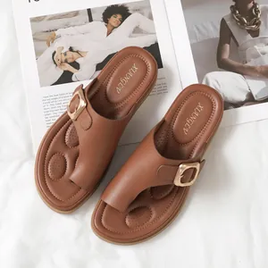 Minimalist brown faux leather toe ring slide sandals with square gold buckle accents