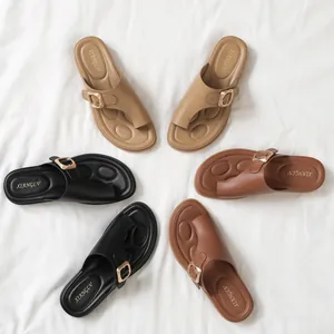 Flat slide sandals for women with metal buckle, toe loop in black, brown and beige colors