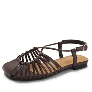 Women's dark brown woven hollow flat beach sandals with adjustable ankle buckle strap