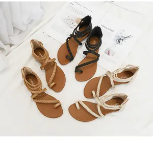 Sandales spartiates plates noires, marron et beige avec brides tressées et zip arrière
