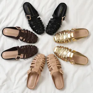 Women's woven closed-toe flat mules in four colors with decorative metal buckles