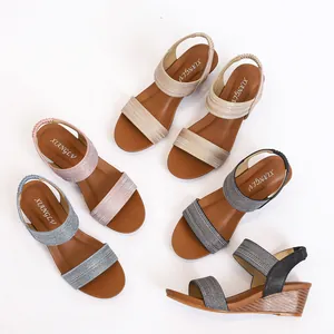 Women's wedge sandals with glitter straps in gold, pink, blue, and grey colors