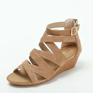 Women's khaki wedge sandals with cross straps and ankle buckle on white background