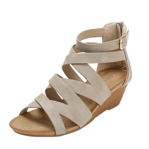 Beige suede wedge sandals with cross straps and wood grain platform for women