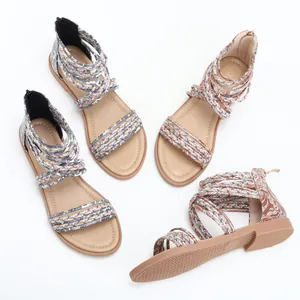 Sandales plates bohèmes pour femmes avec brides tressées colorées et zip à l'arrière