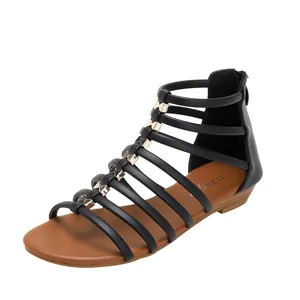 Roman style black strappy wedge sandals for women with golden bow detail and back zipper