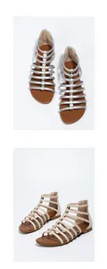 Detail view of Bohemian flat sandals featuring crisscross straps and metal rivet accents