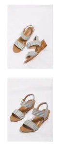 Detalle de sandalias de cuña con tiras de pedrería y tacón con textura de madera