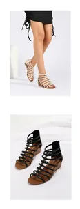 Detail view of stylish wedge sandals in cream and black with elegant metal accents