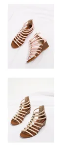 Detail of nude wedge sandals with multi-strap design, golden accents, and rear zipper