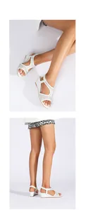 Detail shot of white wedge sandals with sparkling rhinestones and an elastic back strap