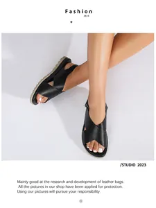 Detail of cross strap flat sandals with non-slip rubber soles for summer fashion