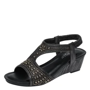 Women's black wedge sandals with crystal T-strap and elastic back strap on white background