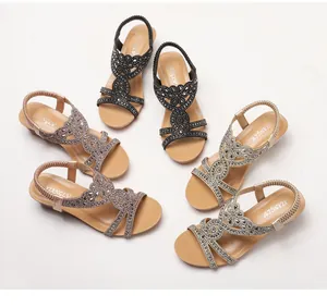 Sandali con zeppa piatta con strass bohémien e cinturini elastici in tre colori