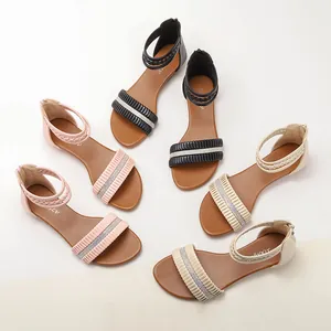 Flat wedge sandals in black, pink and beige with sparkling rhinestones and ruched straps