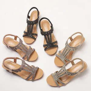 Women's rhinestone wedge sandals in black, silver and champagne with elastic straps