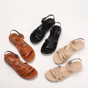 Platform wedge sandals for women in black, tan, and beige with elegant cross straps