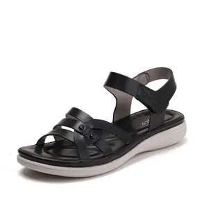 Women's casual wedge sandals with black cross straps and adjustable velcro closure